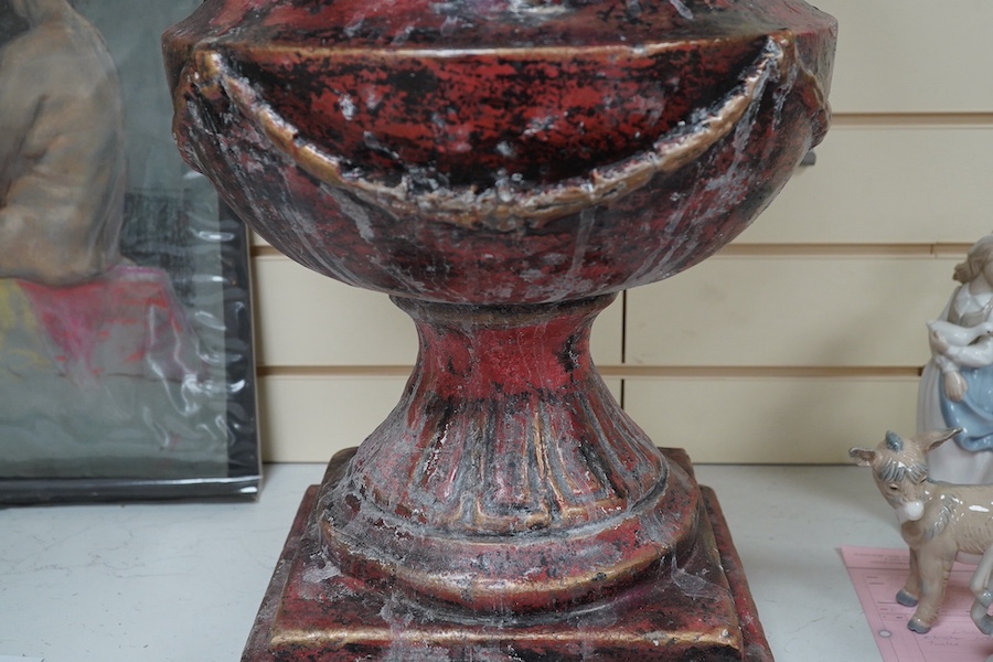 A large painted cast plaster urn, 59cm high. Condition - fair to good.